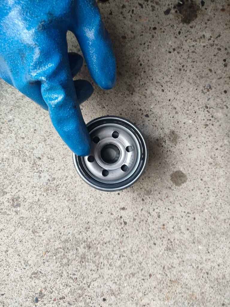 Applying a small amount of engine oil to the O-ring